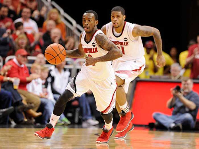 Louisville's in-game energy and stamina can be partly attributed to its rigorous practices. (Greg Nelson/SI)